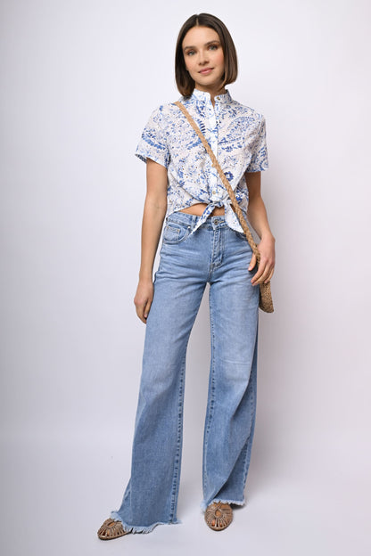 Jeans a gamba ampia sfrangiati